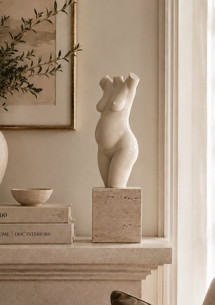 A commissioned torso sculpture in ivory lacquer, detail.